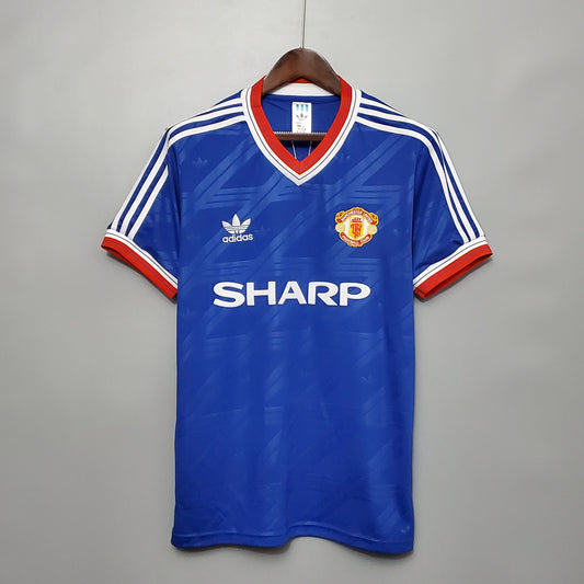 MANCHESTER UNITED I 86/88 MASCULINA (RETRÔ)